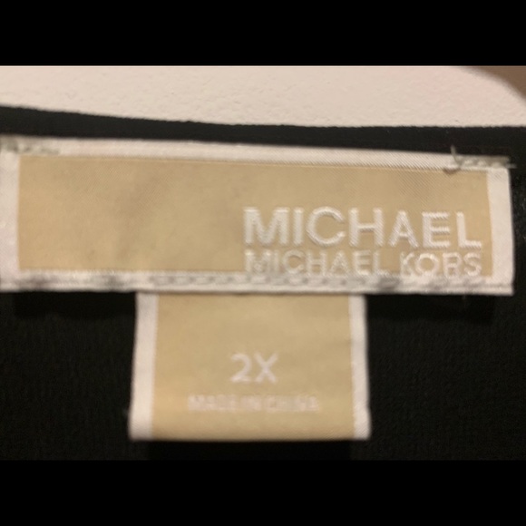 A Micheal Kors shirt. That is very comfortable. - Picture 3 of 3
